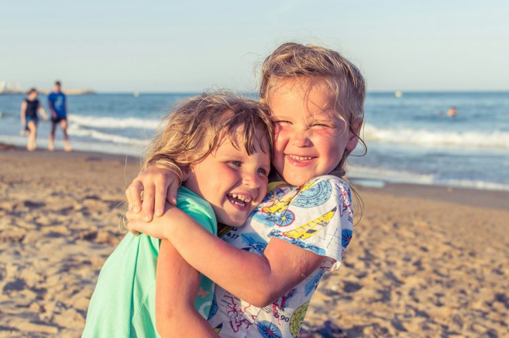 children playing beach in cabo san lucas