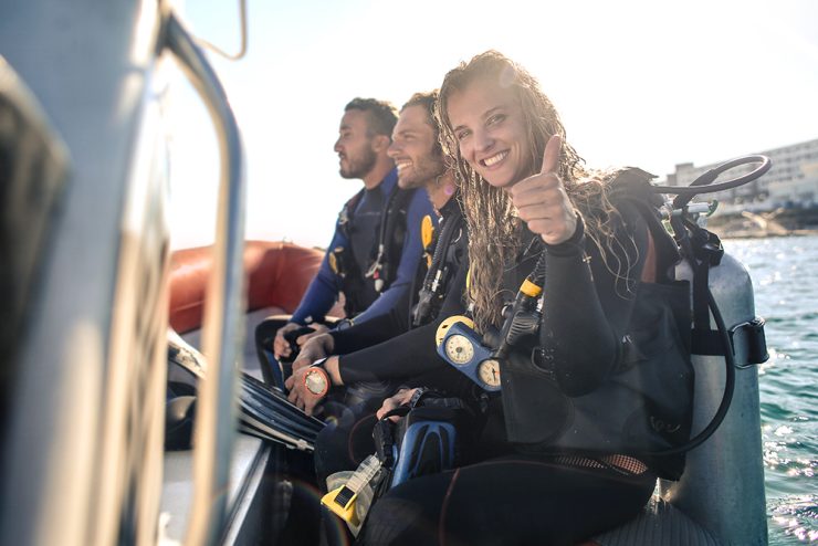 Scuba diver group on boat in Cabo San Lucas