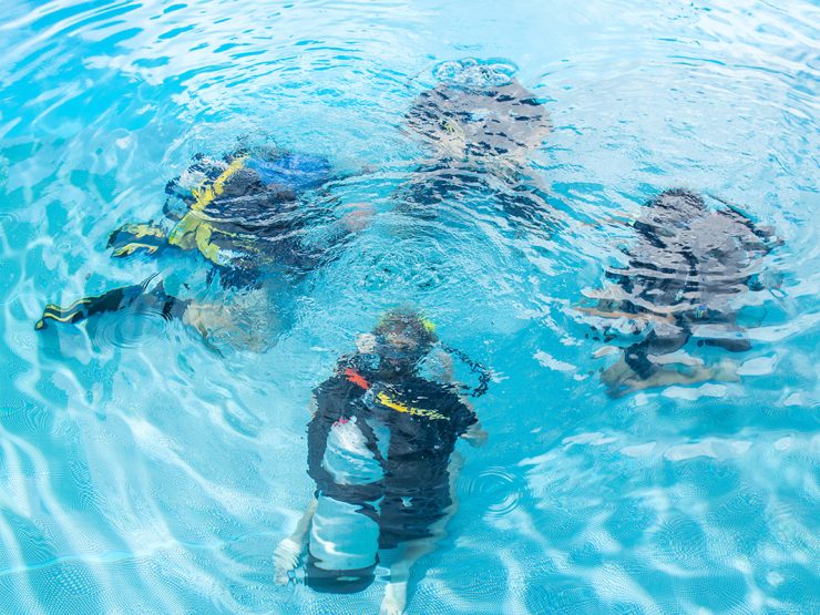 scuba diver training pool session