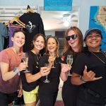 scuba diving group celebrating after diving